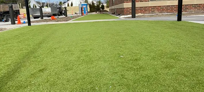 commercial synthetic lawn turf in front of business