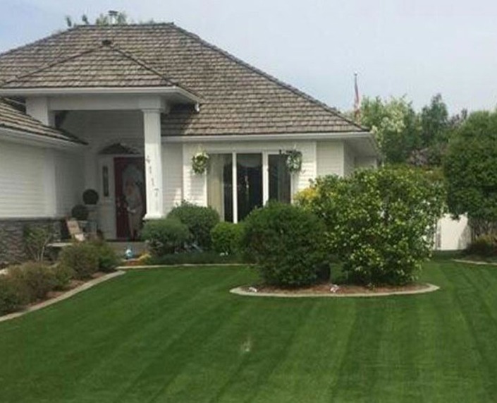 front yard with artificial turf grass