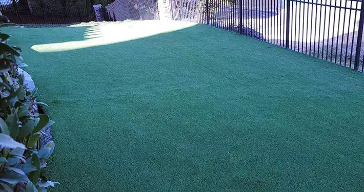artificial turf inside of fence